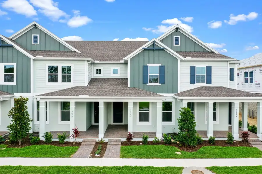 Representative exterior photo of a completed home built from the Edison by Rockwell Homes in Harvest at Ovation - Townhomes, Winter Garden, FL (Image 29).