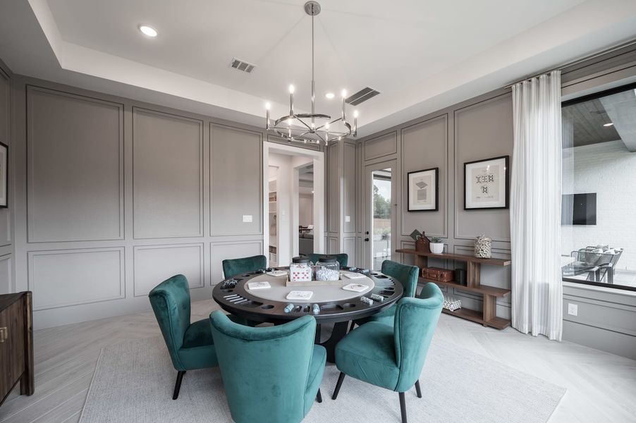 Representative furnished interior of a home built from the Carignan by Tri Pointe Homes in Woodson’s Reserve, Spring (Image 32).