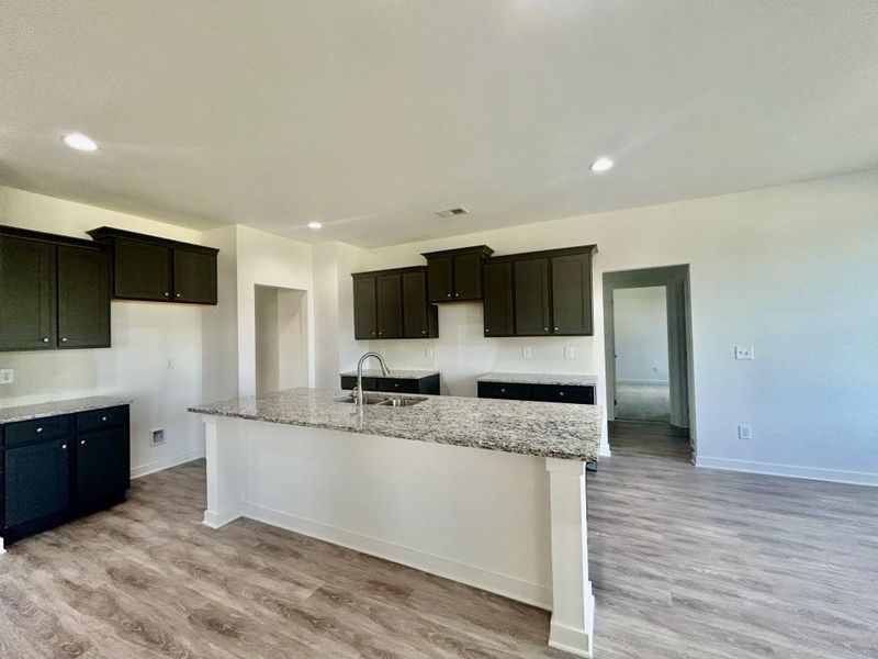 Furnished interior view inside a new home in Sutton's Landing, Statham (Image 4).