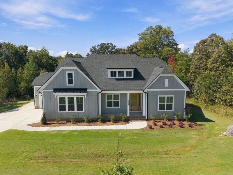 Front exterior of a new home in Shepherds Trace, Clover, SC, highlighting curb appeal (Image 1). Front exterior of a new home in Shepherds Trace, Clover, SC, highlighting curb appeal (Image 1).