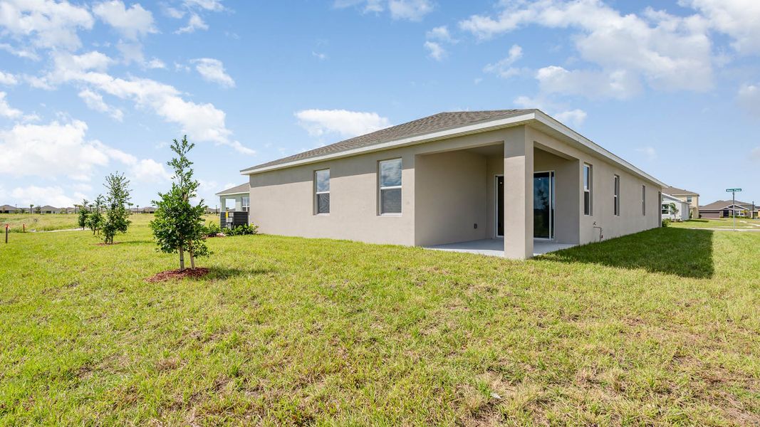 Exterior details and patio area of a home in Cypress Bay West, Palm Bay (Image 3).