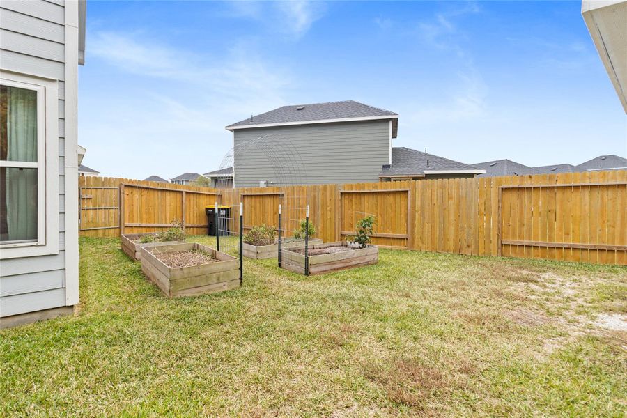 Exterior details and patio area of a home in Marie Village, Conroe (Image 3).