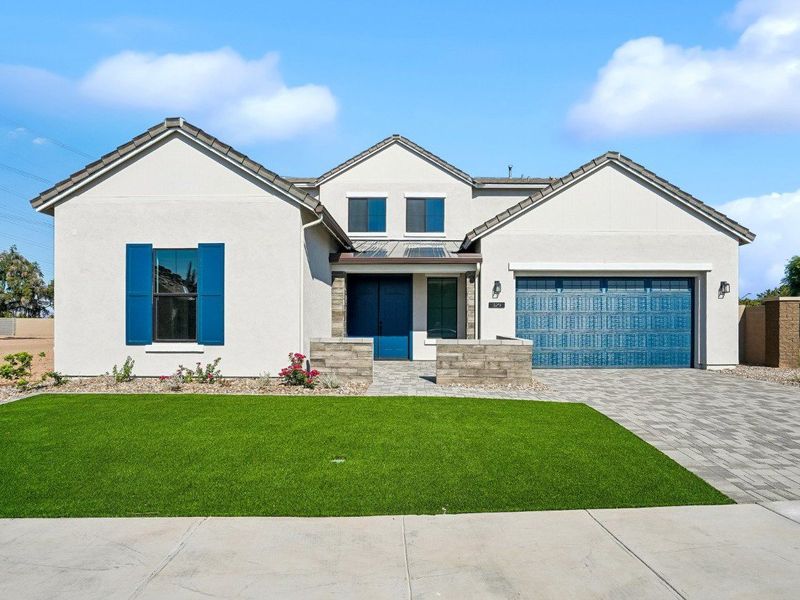 Front exterior of a new home in 33 North, Gilbert, AZ, highlighting curb appeal (Image 1). Front exterior of a new home in 33 North, Gilbert, AZ, highlighting curb appeal (Image 1).