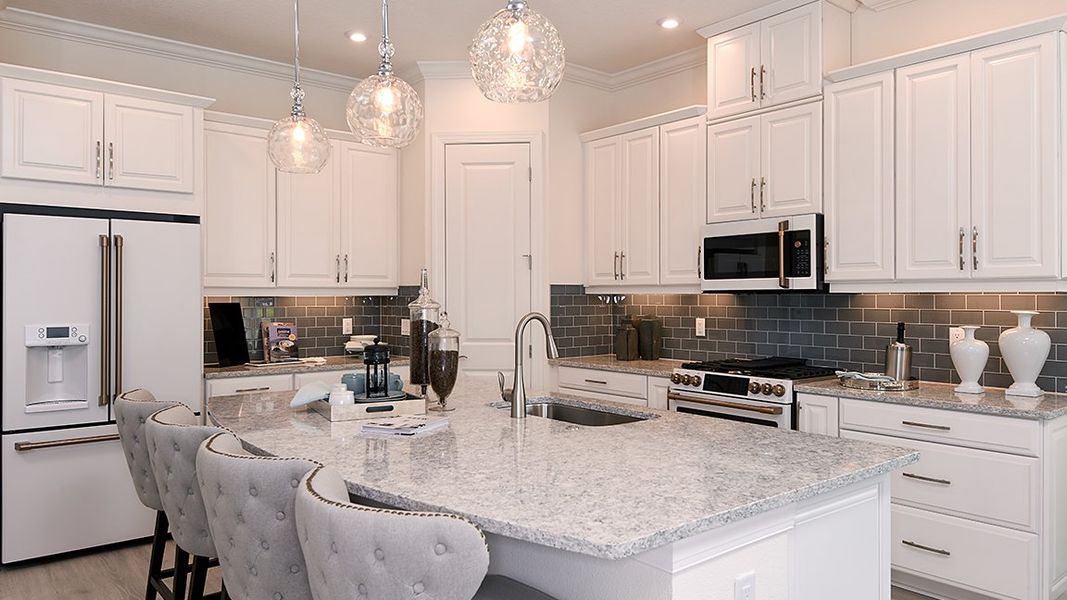 Representative furnished interior of a home built from the Farnese by Taylor Morrison in Esplanade at Azario Lakewood Ranch, Lakewood Ranch (Image 7). Representative furnished interior of a home built from the Farnese by Taylor Morrison in Esplanade at Azario Lakewood Ranch, Lakewood Ranch (Image 7).