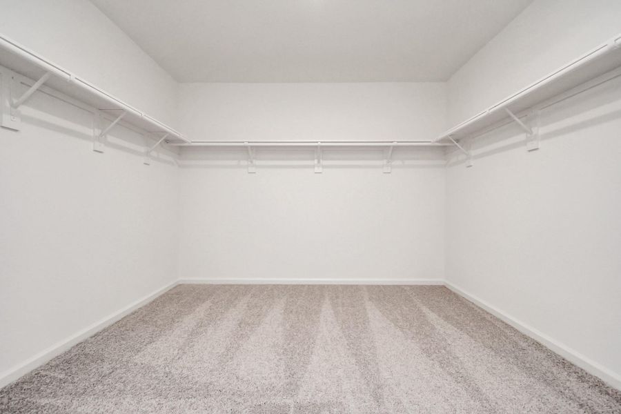 Spacious, unfurnished interior of a new home in Sunterra, Katy (Image 33).