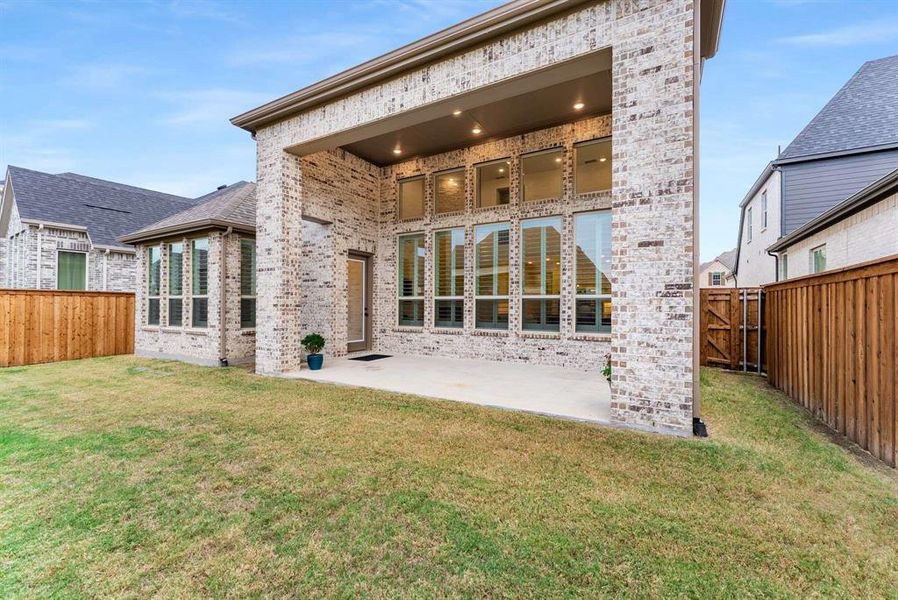 Exterior details and patio area of a home in Mosaic, Celina (Image 21).