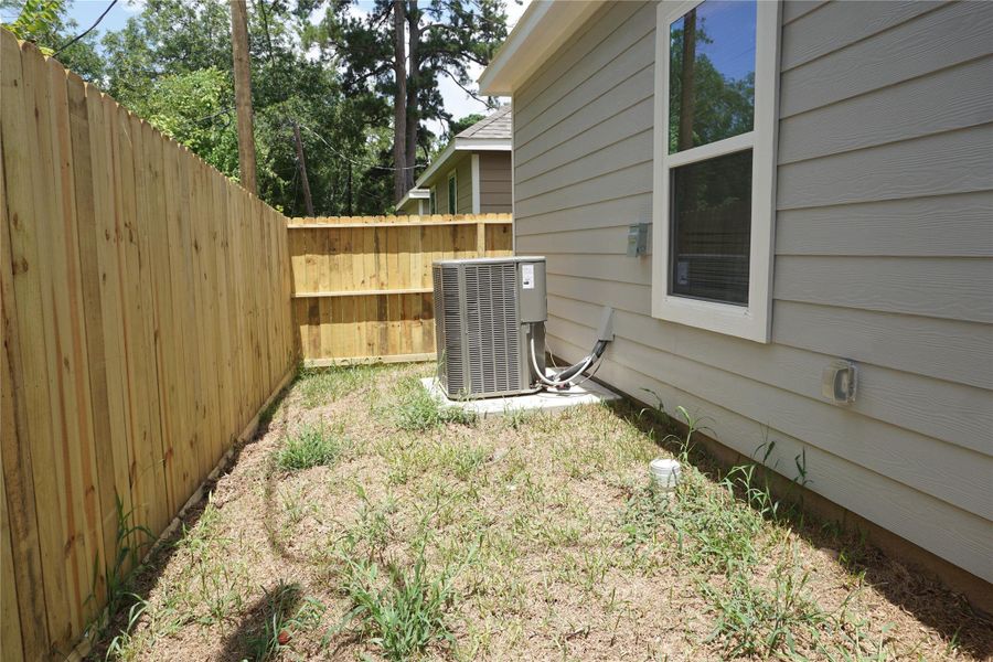 Exterior details and patio area of a home in , Willis (Image 2). Exterior details and patio area of a home in , Willis (Image 2).