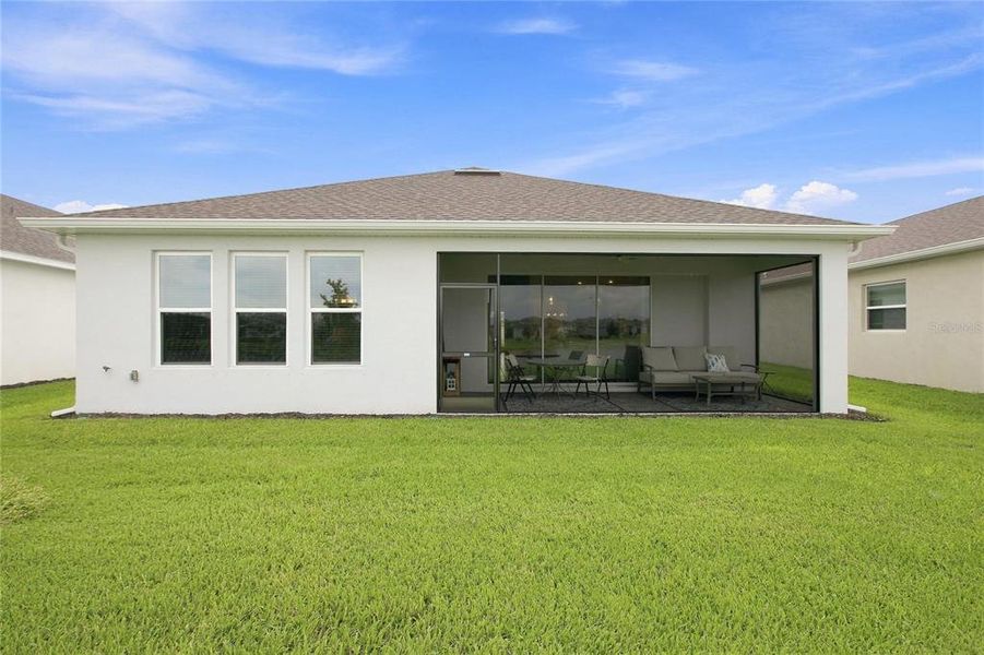 Exterior details and patio area of a home in The Cove at West Port, Port Charlotte (Image 25). Exterior details and patio area of a home in The Cove at West Port, Port Charlotte (Image 25).