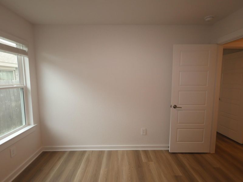 Spacious, unfurnished interior of a new home in Pinewood at Grand Texas, New Caney (Image 27).