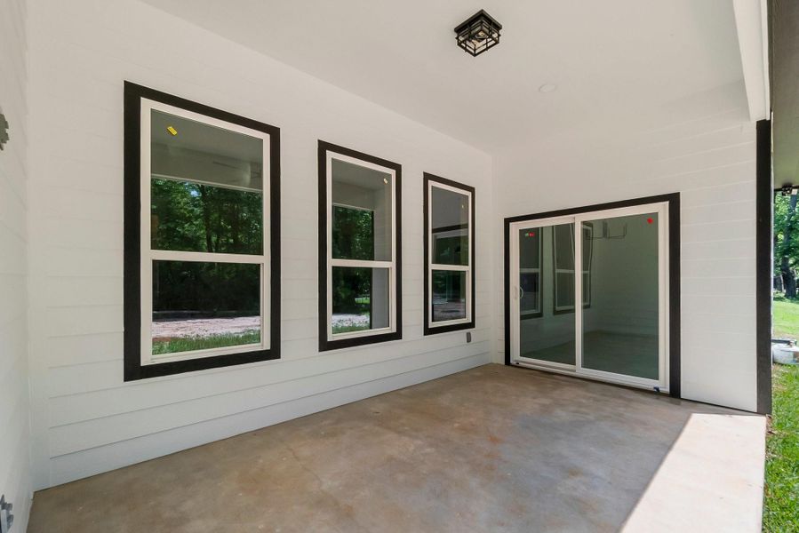 Exterior details and patio area of a home in , Livingston (Image 3).