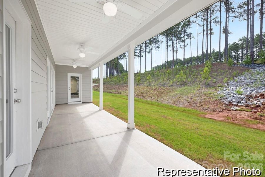Exterior details and patio area of a home in Whispering Hills, Locust (Image 3).