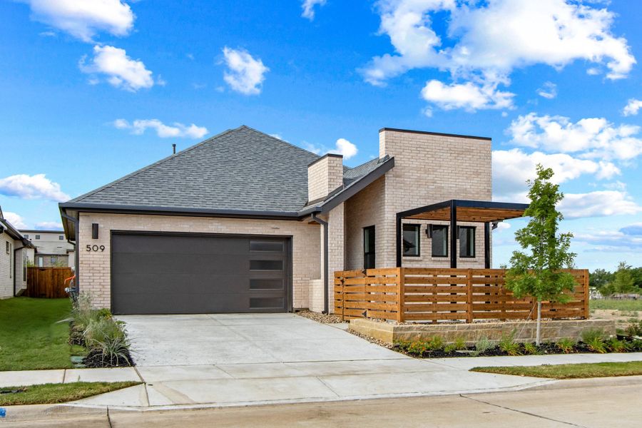 Front exterior of a new home in Willow Grove Single-Family Homes, Melissa, TX, highlighting curb appeal (Image 2). Front exterior of a new home in Willow Grove Single-Family Homes, Melissa, TX, highlighting curb appeal (Image 2).
