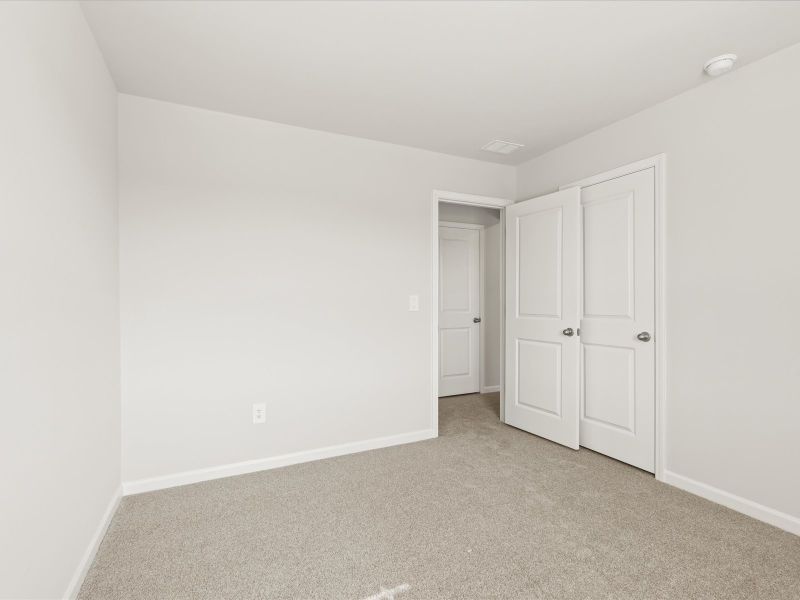 Spacious, unfurnished interior of a new home in Brayfield Manor - Heritage Collection, Wellford (Image 23).