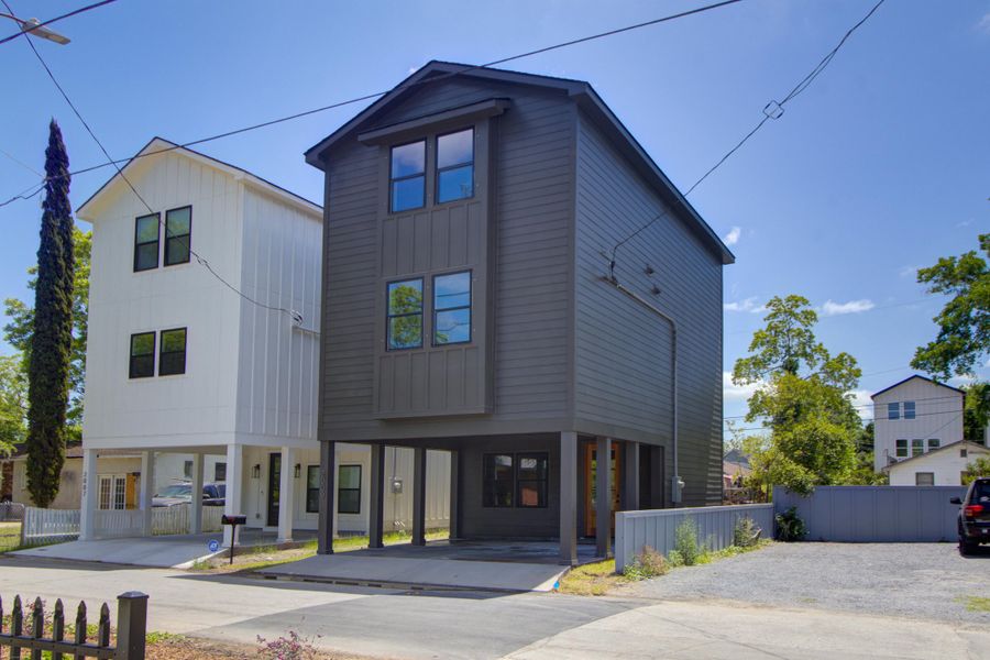 Front exterior of a new home in , Charleston, SC, highlighting curb appeal (Image 24).