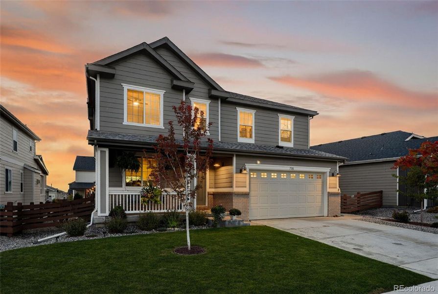 Front exterior of a new home in Colliers Hill, Erie, CO, highlighting curb appeal (Image 23). Front exterior of a new home in Colliers Hill, Erie, CO, highlighting curb appeal (Image 23).