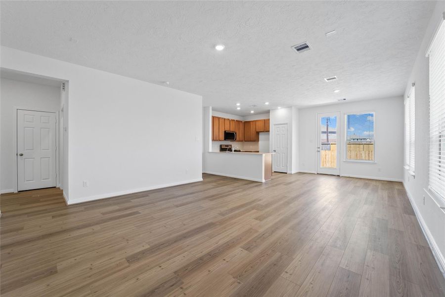 Enter your new home at 5515 Blackbird Lane and be welcomed by the Bandera vinyl plank flooring in Light Pine, and fresh, bright paint that combine to create a warm and inviting space.