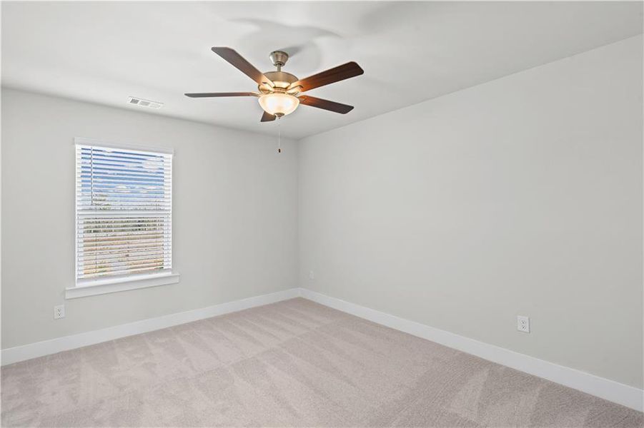 Spacious, unfurnished interior of a new home in Creekside at Skelton, Jefferson (Image 22).