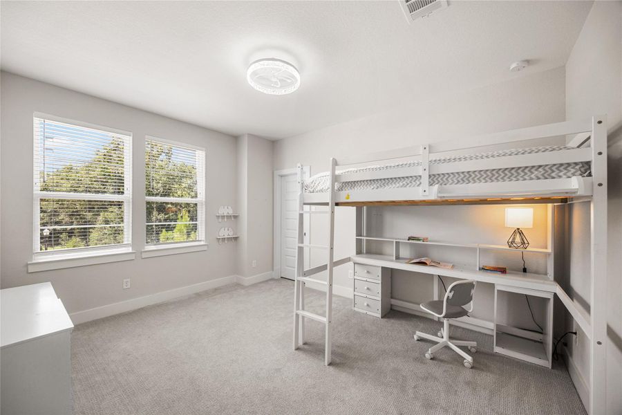 Furnished interior view inside a new home in Woodson’s Reserve, Spring (Image 33).