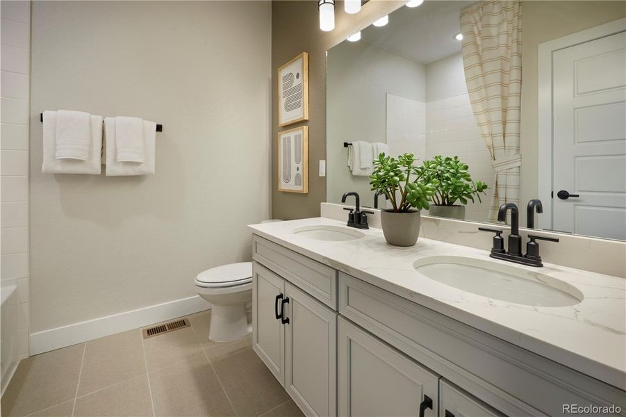 Furnished interior view inside a new home in The Aurora Highlands, Aurora (Image 19).