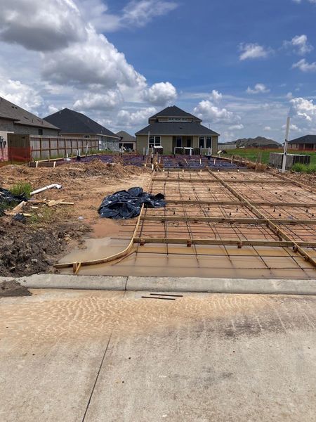 Front exterior of a new home in Westland Ranch 50' Homesites, League City, TX, highlighting curb appeal (Image 2).
