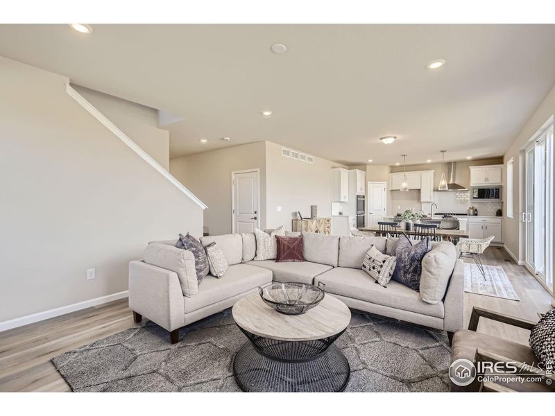 Great room *Photo not of actual home, but same floorplan and style*