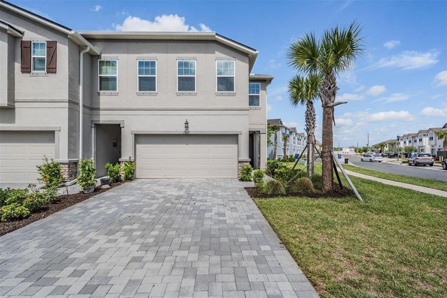 Front exterior of a new home in , Lutz, FL, highlighting curb appeal (Image 24).