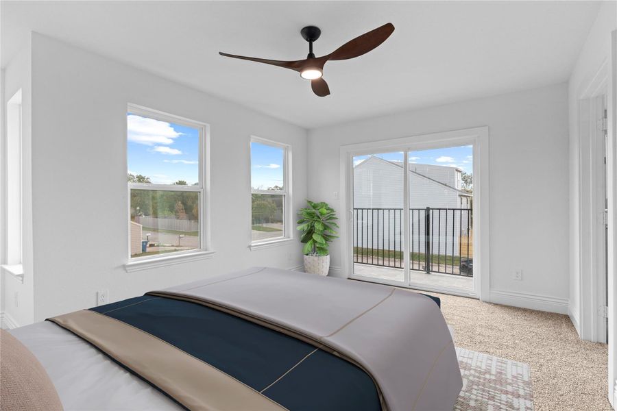 The primary suite has high ceilings.  Open the beautiful sliding glass door to your private outdoor balcony. *Virtual stage*