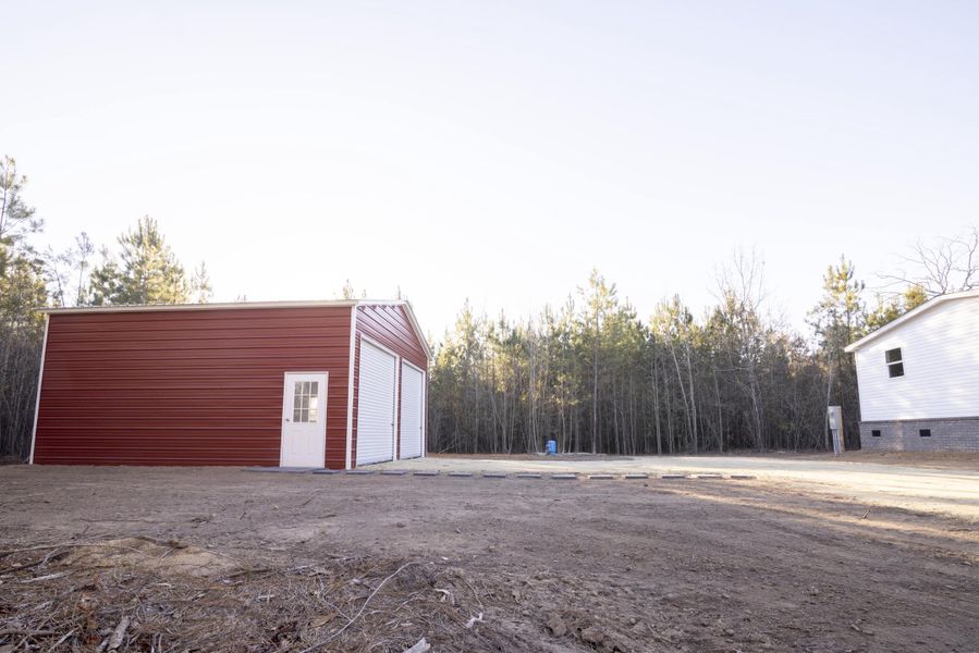 Exterior details and patio area of a home in , St. Stephen (Image 21).