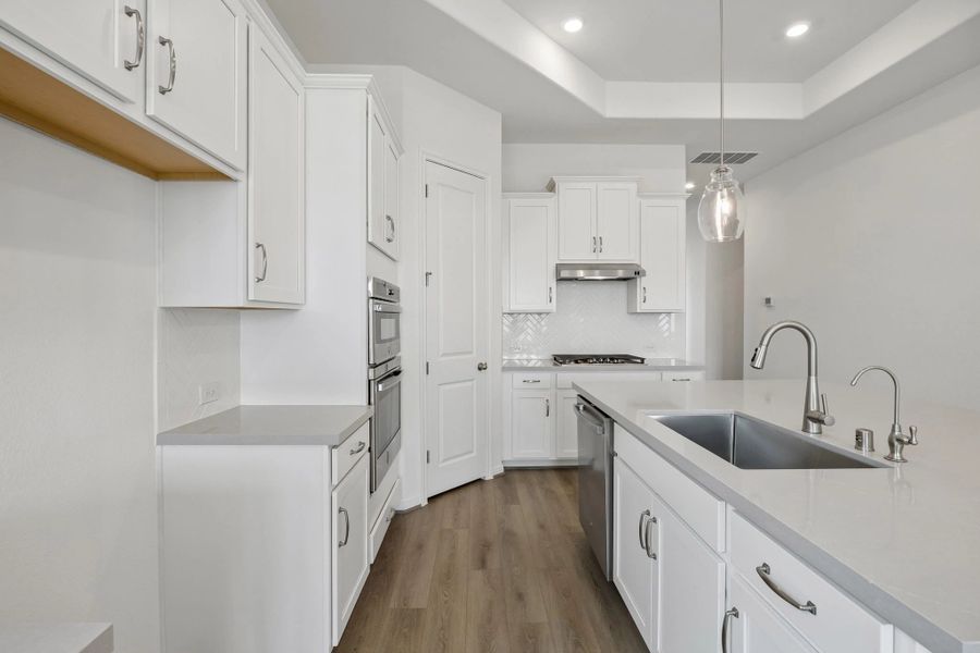 Kitchen. Sample product photo. Actual exterior and interior selections may vary by homesite. Photo may be virtually staged.