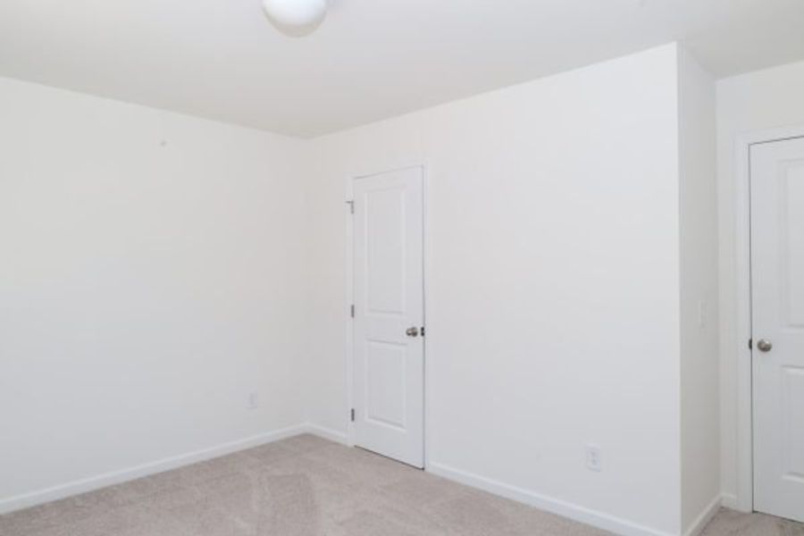 Representative unfurnished interior of a home built from the Emory Townhome by Piedmont Residential in The Retreat at Browns Ridge, Newnan (Image 30).