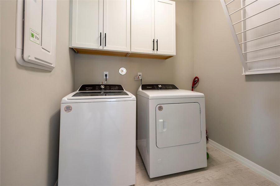 Upstairs laundry room for convenience