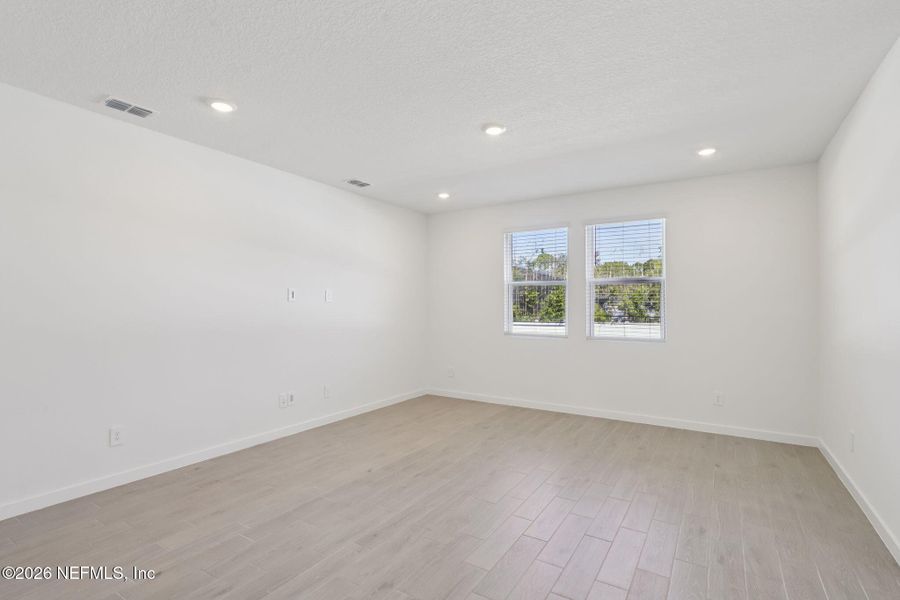 Spacious, unfurnished interior of a new home in Flagler Village - Signature Series, Palm Coast (Image 27).