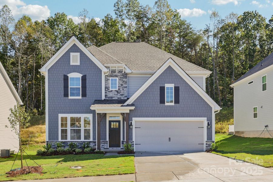 Front exterior of a new home in Falls Cove, Troutman, NC, highlighting curb appeal (Image 2).