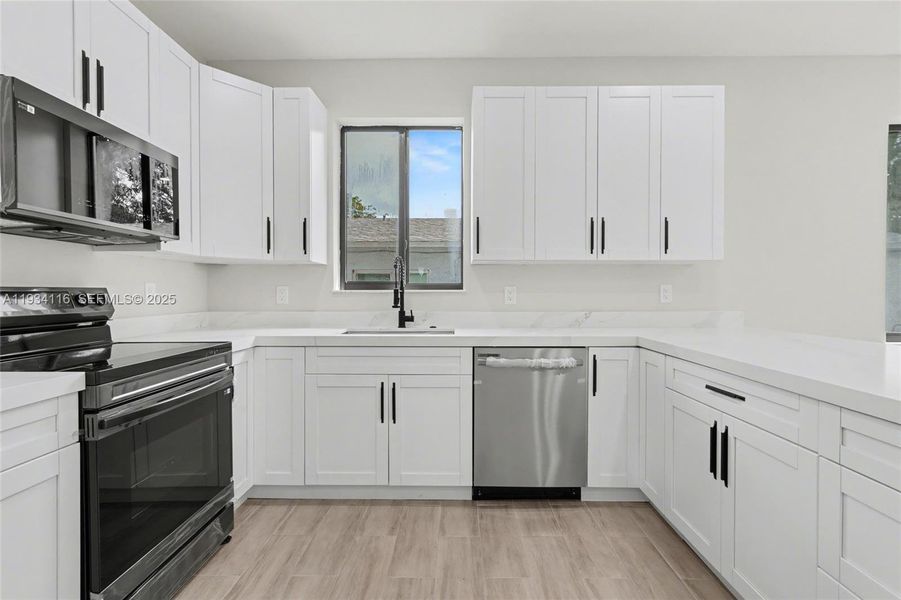 Furnished interior view inside a new home in , Dania Beach (Image 9). Furnished interior view inside a new home in , Dania Beach (Image 9).