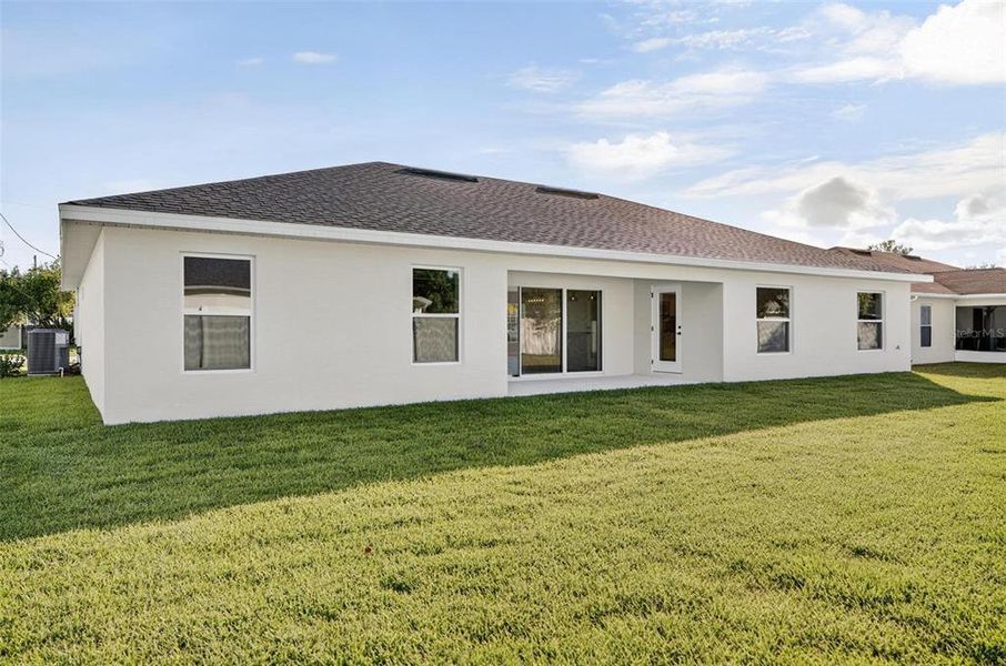 Front exterior of a new home in , Palm Coast, FL, highlighting curb appeal (Image 26).