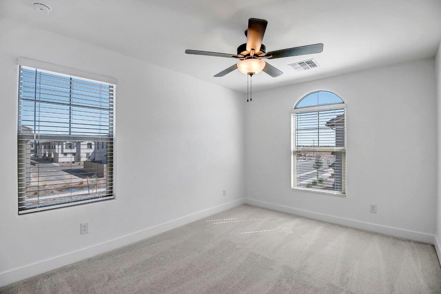 Spacious, unfurnished interior of a new home in Ironwood Villages at North Creek, Queen Creek (Image 23).
