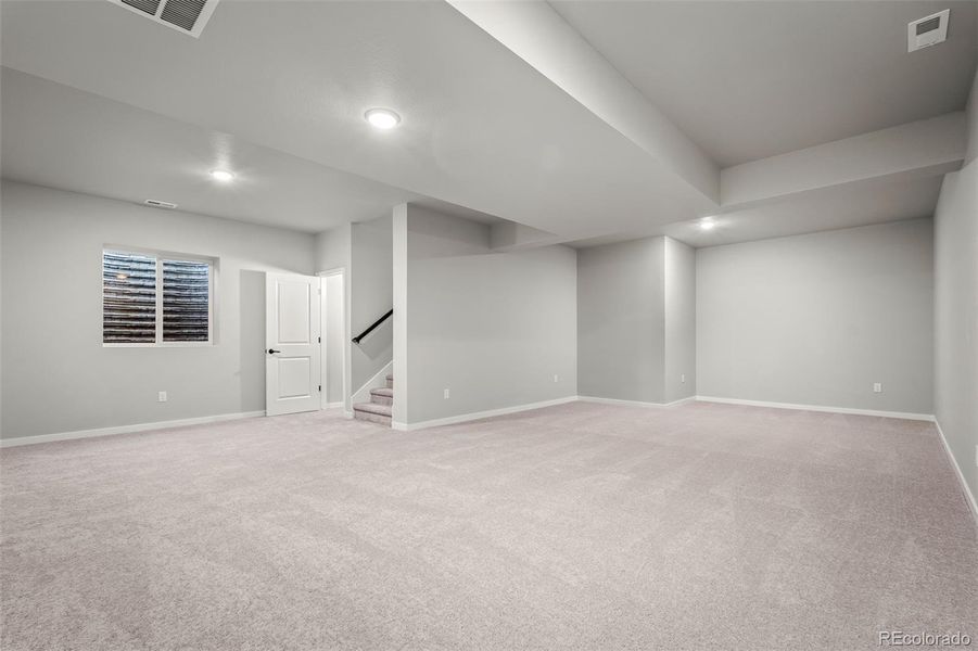 Spacious, unfurnished interior of a new home in Revel Crossing at Wolf Ranch – The Outlook Collection, Colorado Springs (Image 35).