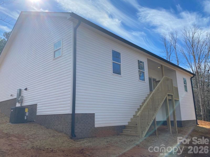 Exterior details and patio area of a home in , Troy (Image 17). Exterior details and patio area of a home in , Troy (Image 17).