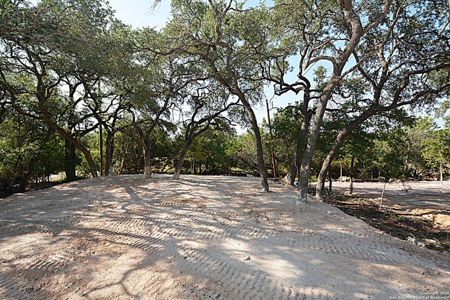 Front exterior of a new home in , Spring Branch, TX, highlighting curb appeal (Image 1).