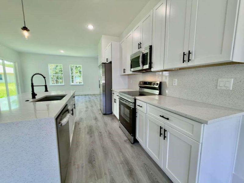 Furnished interior view inside a new home in , Ocala (Image 8).