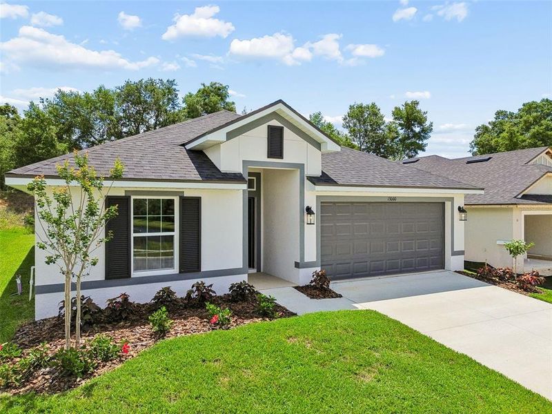 Front exterior of a new home in Abbey Glen, Dade City, FL, highlighting curb appeal (Image 33). Front exterior of a new home in Abbey Glen, Dade City, FL, highlighting curb appeal (Image 33).