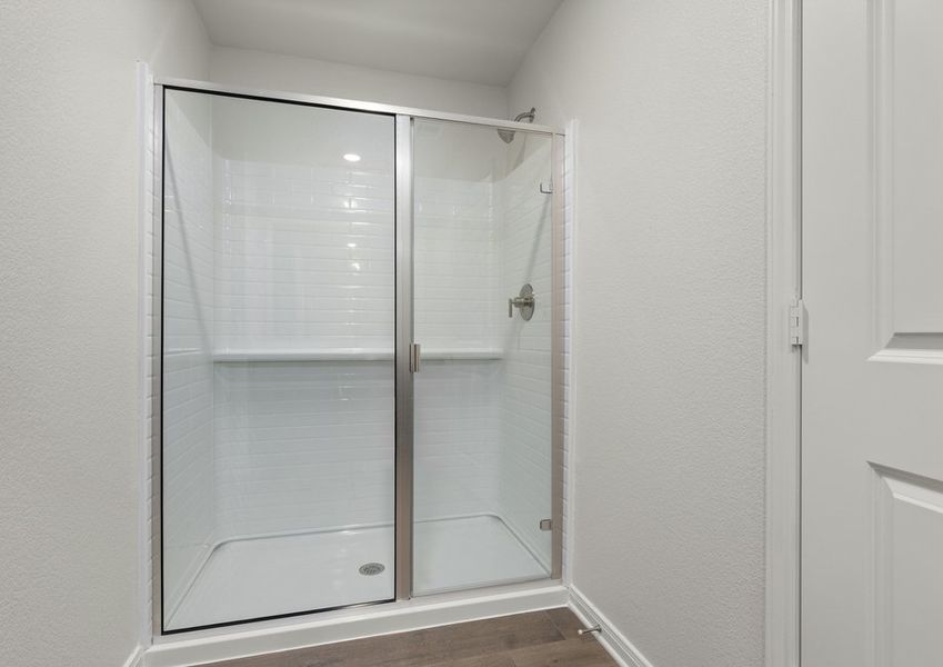 The master bathroom has a glass walk-in shower. The master bathroom has a glass walk-in shower.