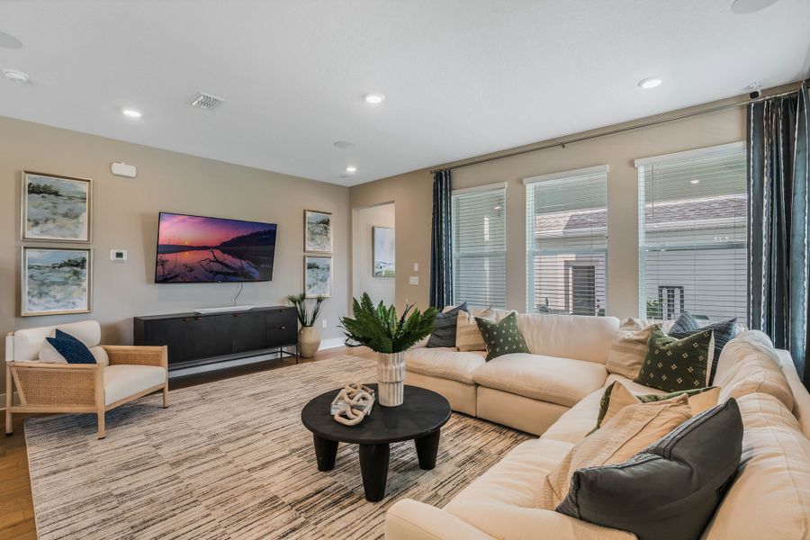 Furnished interior view inside a new home in Harvest at Ovation - Townhomes, Winter Garden (Image 13).