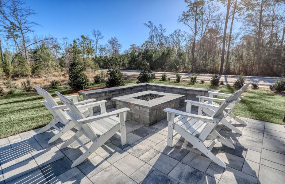 The outdoor patio beckons with its welcoming allure, offering a serene escape.