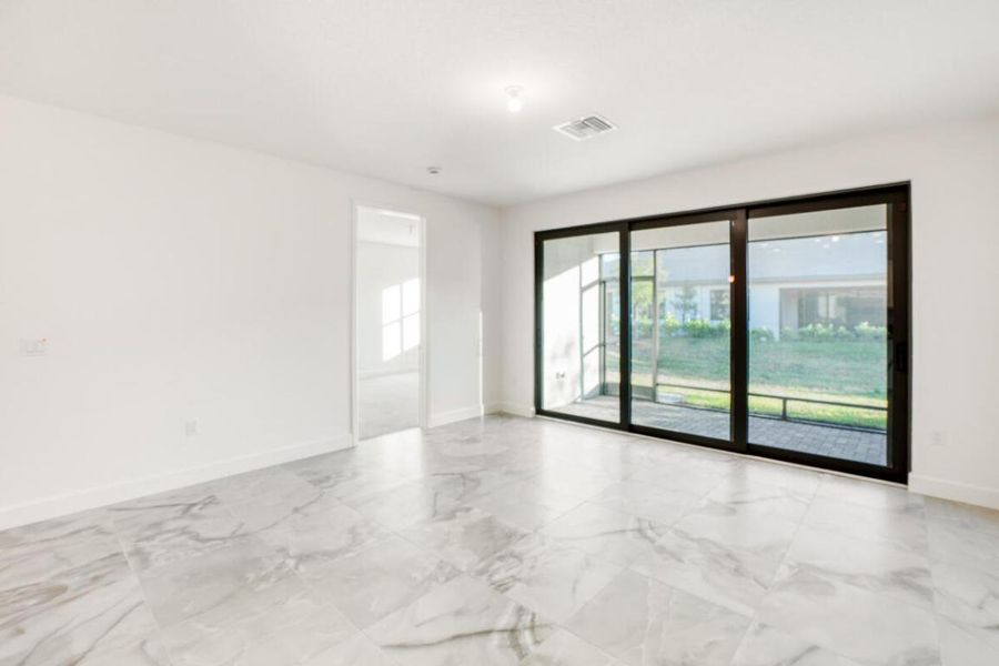 Living room view to screened patio