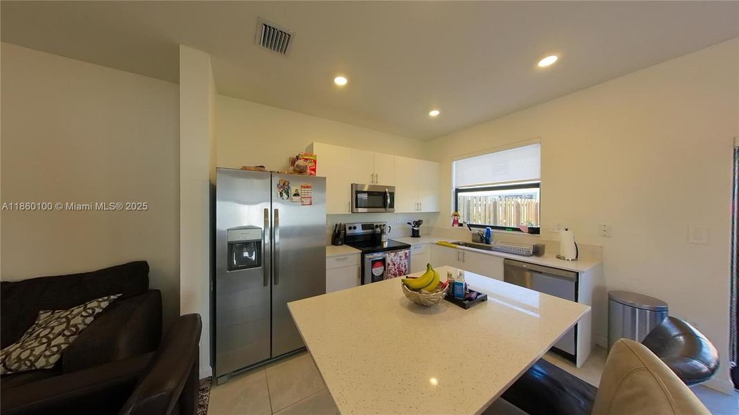 Furnished interior view inside a new home in , Homestead (Image 4). Furnished interior view inside a new home in , Homestead (Image 4).