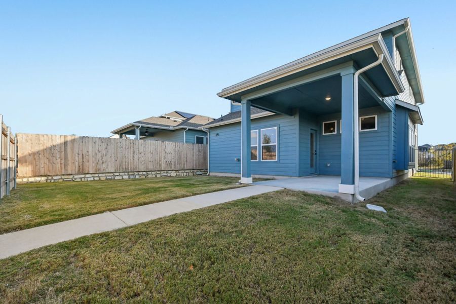 Exterior details and patio area of a home in Whisper Valley, Manor (Image 20). Exterior details and patio area of a home in Whisper Valley, Manor (Image 20).