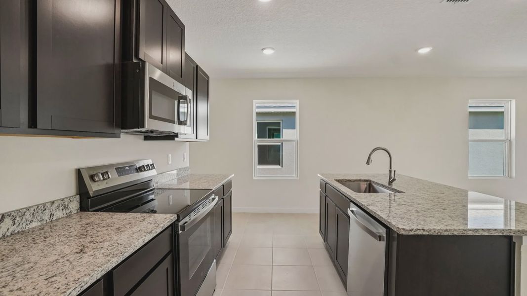 Furnished interior view inside a new home in Willowbrook North, Winter Haven (Image 16).