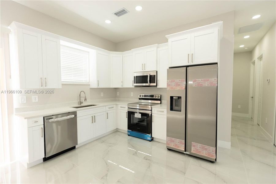 Furnished interior view inside a new home in , Lehigh Acres (Image 6).