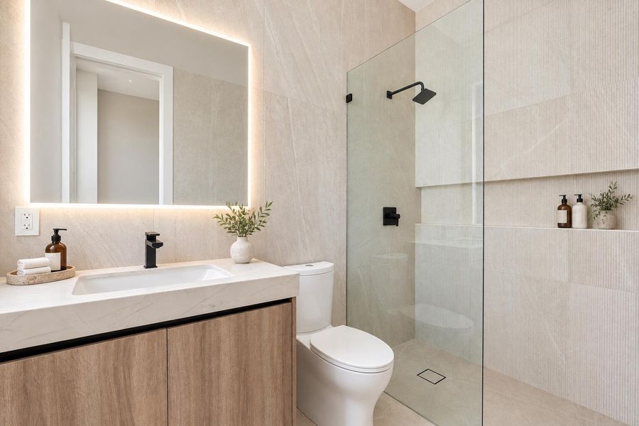Luxury bathroom with elegant backlit mir
